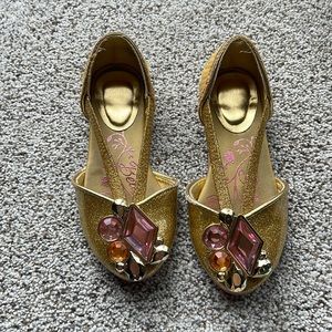 Disney princess Belle gold shoes. Used & loved. Some scuffs, small stain .